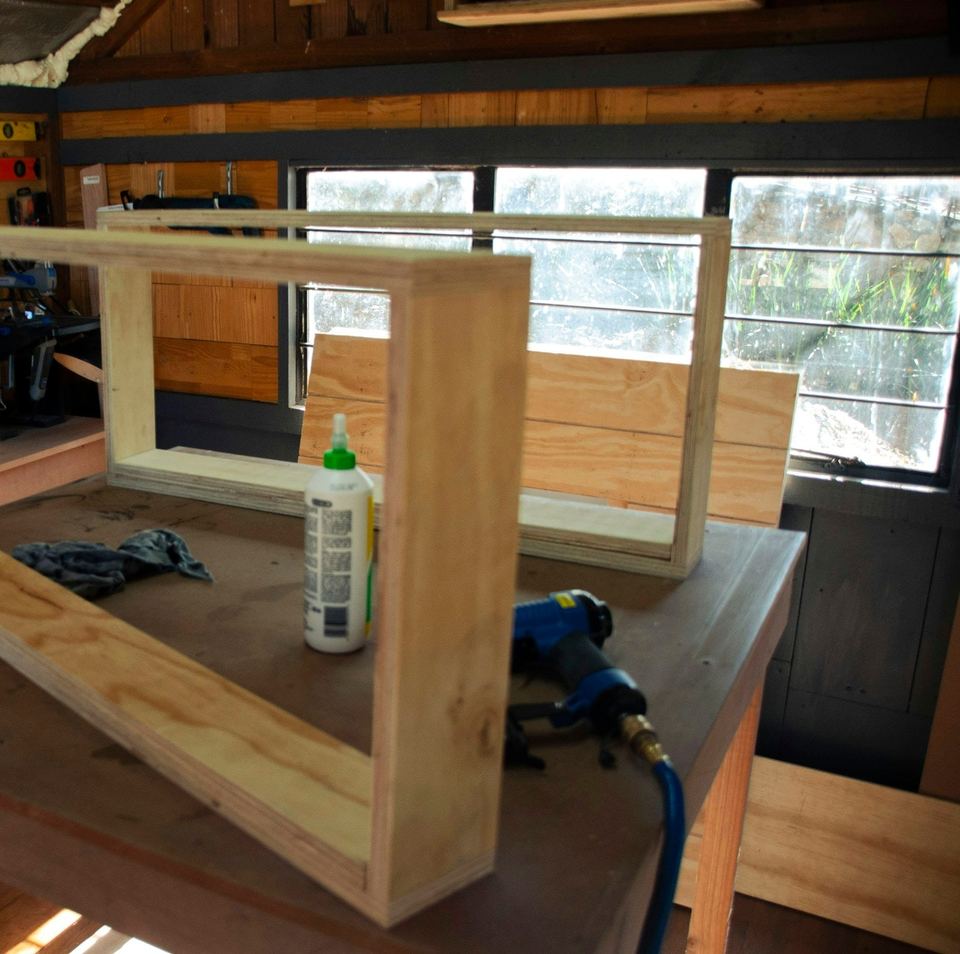 A timber frame glued up on the workbench